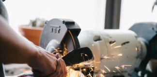 person welding steel