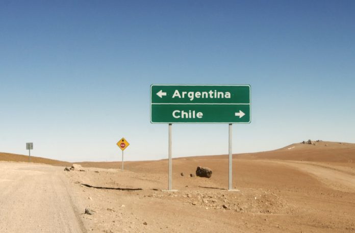 green and white road sign