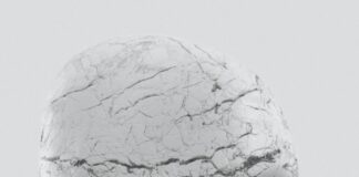 a woman's head with cracked paint on it