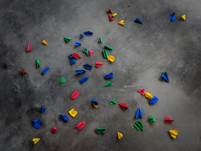 origamis on concrete pavement